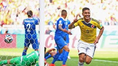 Teofilo Gutierrez of Colombia celebrates after scoring his team's second goal during their 2014 World Cup Group C match against Greece on Saturday. Paul Gilham / Getty Images