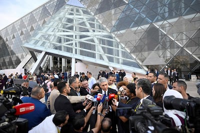 Egypt's Minister of Tourism and Antiquities Sherif Fathy speaks to the press as he arrives for the opening of the Grand Egyptian Museum (GEM) in Giza. AFP