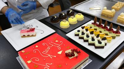 Up to 5,000 sandwiches are made daily and 10,000 canapes. Pawan Singh / The National