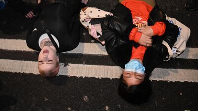 Protesters gather outside Parliament square during a protest for the murder of Sarah Everard, in London. EPA