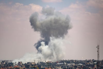 Smoke rises after an Israeli air strike in Rafah. EPA