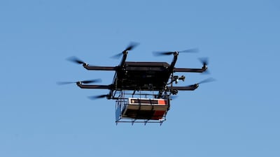 A drone demonstrates delivery capabilities from the top of a UPS truck during testing in the US in February 2017. Reuters