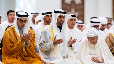 President Sheikh Mohamed performs Eid Al Adha prayers, with Sheikh Mansour bin Zayed, Vice President, Deputy Prime Minister and Chairman of the Presidential Court, and Sheikh Abdullah bin Bayyah, head of the Abu Dhabi Forum for Peace and Chairman of the UAE Council for Fatwa, at Sheikh Zayed Grand Mosque, Abu Dhabi. Photo: UAE Presidential Court