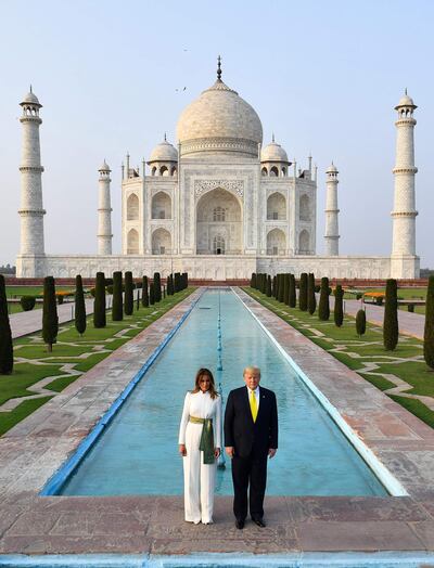 US President Donald Trump and First Lady Melania Trump pose in front of the Taj Mahal. AFP