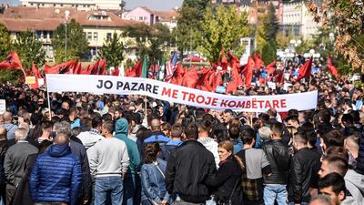 Demonstrators hold a banner that states, in Albanian, 'no bargaining on national lands' during a protest in Pristina, Kosovo, on September 29, 2018. EPA