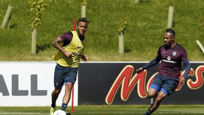 Ryan Bertrand dribbles against Southampton teammate Nathaniel Clyne during England training on Thursday. John Sibley / Action Images / Reuters / June 4, 2015