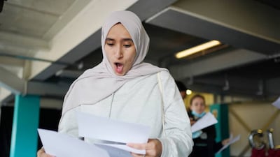 Amira Adrwish opens her GCSE results at Core's City Academy in Birmingham, West Midlands.