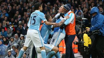 Samir Nasri of Manchester City celebrates scoring his team’s second goal with team mates during the Premier League match between Manchester City and West Bromwich Albion at the Etihad Stadium on April 9, 2016 in Manchester, England. (Photo by Jan Kruger/Getty Images)