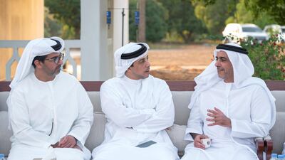 Sheikh Saif bin Zayed, Sheikh Mansour bin Zayed and Sheikh Hamed bin Zayed, Abu Dhabi Executive Council Member, attend an Al Maqam Palace barza. Hamad Al Kaabi / Ministry of Presidential Affairs