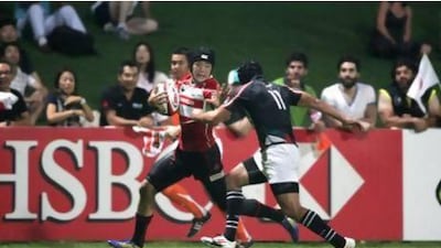 Cyrus Homayoun, right, the UAE winger, was part of an overworked defence against Japan on Friday. But Renier Els, the Emirates captain, hopes his side will havemore of the ball against Philippines. Jaime Puebla / The National