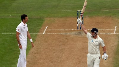 Hamish Rutherford celebrates reaching his maiden hundred against England.