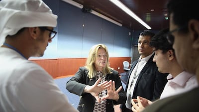 Dr Ellen Stofan, Nasa’s chief scientist, talks with Khalifa University students and faculty about the space agency’s science programme. She was attending the university to give a lecture on the search for extraterrestrial life. Delores Johnson / The National