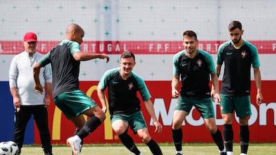 Joao Mario, Mario Rui, Raphael Guerreiro and Bruno Fernandes take part in training for Portugal. Diogo Pinto / AP Photo