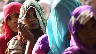 Women queue to vote in the northern state of Uttar Pradesh. AFP/Money Sharma