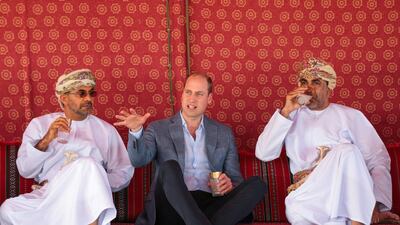 Britain's Prince William meets with officials from Oman's Ministry of Fisheries during a visit to Muscat. REUTERS