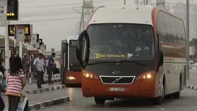 People waiting to take the bus at RTA station at Ibn Battuta metro station in Dubai. Jaime Puebla / The National