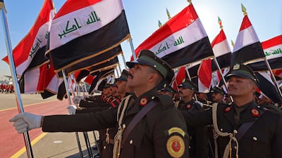Newly graduated Iraqi military officers take part in a Baghdad parade to mark the 105th anniversary of the founding of army. AFP