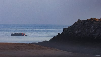 Migrants in an overloaded boat leave Grand-Fort-Philippe, near Calais, to cross the English Channel to the UK. Reuters