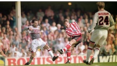 Southampton's Matthew Le Tissier takes a shot as Manchester United's Ryan Gigg makes a challenge during a league clash in April 1996, which the Saints won 3-1.
