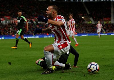 Jese is challenged by Adam Smith and subsequently appeals for a penalty during Stoke City's defeat to Bournemouth. Craig Brough / Reuters
