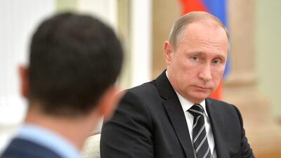 Long-term settlement of the Syrian crisis requires “a political process with the participation of all political forces, ethnic and religious groups,” Mr Putin told Mr Al Assad in comments shown on Russian state television on Wednesday. Alexei Druzhinin / RIA Novosti Kremlin / Reuters