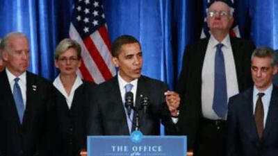 The President-elect Barack Obama holds his first post-election press conference at the Hilton Hotel flanked by his vice president-elect Joe Biden, left, his new chief of staff Rahm Emanuel, right, and members of his Transition Economic Advisory Board on Nov 7 2008 in Chicago, Illinois.