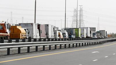 A traffic jam at the Dubai border going towards Abu Dhabi on Sheikh Zayed road in Dubai, as Abu Dhabi Police check movement permits. Pawan Singh / The National