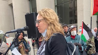 Dana Kornberg addresses protesters in front of the federal building in Detroit, Michigan. Photo: Dana Kornberg