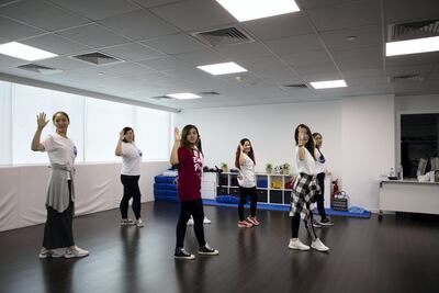 Their ages vary, but a love for K-pop unites the class. Karma Gurung / The National