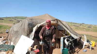 A Bedouin woman outside her tent in Humsah al-Baqia, in the Jordan Valley. A fertile and strategic patch of land that runs from Lake Tiberias to the Dead Sea, the village lies at the centre of the battle over the future of the West Bank. AFP