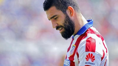 Arda Turan has signed for Barcelona but due to restrictions placed on the club's ability to register players, will not play until 2016. Jose Jordan / AFP