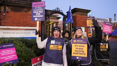 Nurses on strike outside Royal Victoria Infirmary in Newcastle. PA