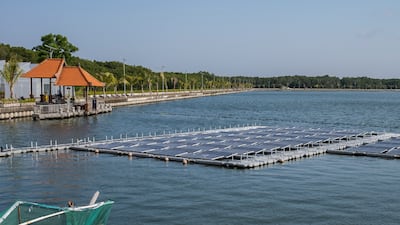 A floating solar power plant at a reservoir in Denpasar, Bali, Indonesia. Major investments of $5 trillion to $7 trillion per year are needed through to 2050 in the energy sector to drive the green energy transition but less than $2 trillion is currently spent each year. EPA