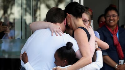 Meghan spent time chatting with wellwishers as she arrived at the NGO. Reuters