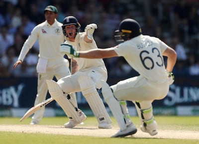 England's Ben Stokes yells at Jos Buttler before the latter is run out. AFP