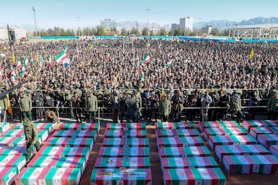 Coffins draped with the Iranian flag during the funeral of victims killed in the twin blasts in Kerman, on January 3. ISIS claimed responsibility for the attack. AFP