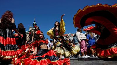 Participants dance in the historical centre of Prague. Reuters