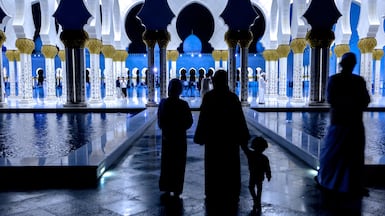 Late-night prayers draw larger crowds to mosques during the final stretch of Ramadan. Victor Besa / The National