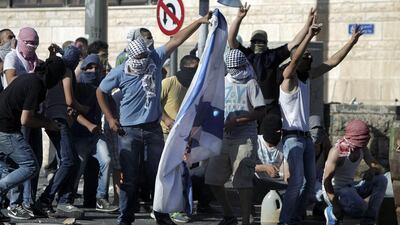 Israeli officials urged calm as police investigated the incidents, hoping to contain the violence. Ahmad Gharabli/AFP Photo
