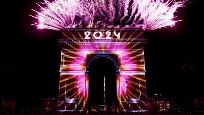 Fireworks illuminate the sky over the Arc de Triomphe during the New Year's celebrations on the Champs Elysees avenue in Paris, France, January 1, 2024. Reuters