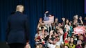 Attendees cheer as US President Donald Trump arrives to speak at a midterm campaign rally at the Rock Hill Sports & Event Center in Rock Hill, South Carolina. AFP