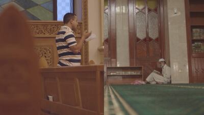 A still from One by Daniel Malak, showing worshippers in an Abu Dhabi mosque. Courtesy Abu Dhabi Film Festival