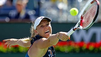 Caroline Wozniacki finally beat Maria Jose Martinez Sanchez at the fourth attempt.