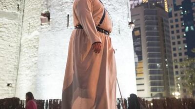 A boy looks at a tower at the Qasr Al Hosn. Reem Mohammed / The National