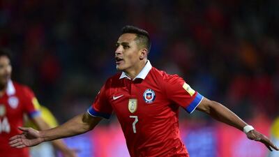 Chile’s Alexis Sanchez celebrates after scoring against Brazil for his team’s second goal in a 2018 World Cup qualifying victory on Thursday night. Martin Bernetti / AFP