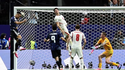 Argentina's Lautaro Martinez heads home to make it 2-1. EPA
