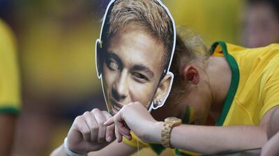 A dejected Brazil fan holds a Neymar mask after Brazil's 7-1 loss to Germany in the 2014 World Cup semi-finals on Tuesday night in Belo Horizonte, Brazil. Fernando Bizerra Jr / EPA