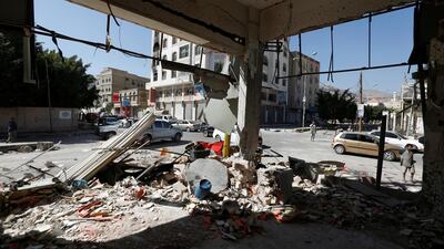 A view of damage on a street where Houthis recently clashed with forces loyal to slain Yemeni former president Ali Abdullah Saleh in Sanaa. Khaled Abdullah / Reuters