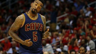 JR Smith of the Cleveland Cavaliers reacts after hitting a three pointer in his team's Game 1 win over the Atlanta Hawks in the Eastern Conference finals on Wednesday Kevin C Cox / Getty Images / AFP / May 20, 2015