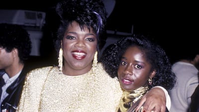 Oprah Winfrey wears a white dress with gold detailing to attend 58th Annual Academy Awards with Akosua Busia on March 24, 1986 at the Dorothy Chandler Pavilion in Los Angeles, California. Getty Images